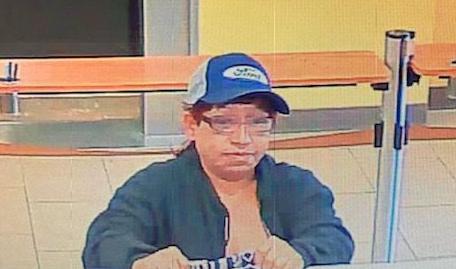Cameras capture woman suspected of robbing Edna bank